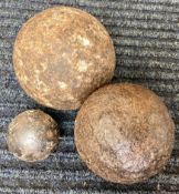 Three small cannon balls.