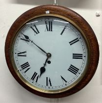A good oak circular kitchen wall clock.