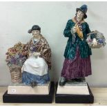 Two decorative figures.