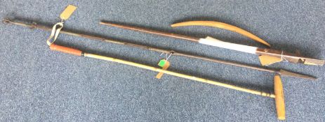 An old spear together with a bow etc.