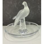 LALIQUE: A small glass pin dish decorated with figure of bird.