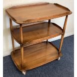 ERCOL: A small three-tier trolley.