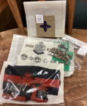 A collection of Military brooches etc.