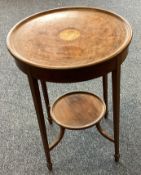 A Victorian inlaid occasional table.