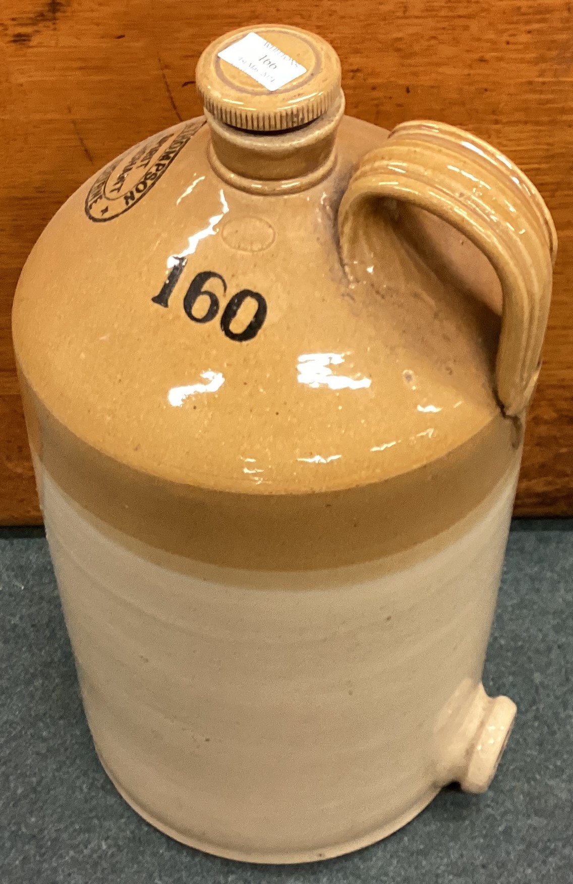 A large stoneware bottle. - Image 3 of 4