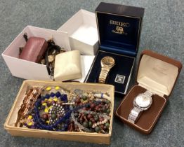A collection of wristwatches, jewellery etc.