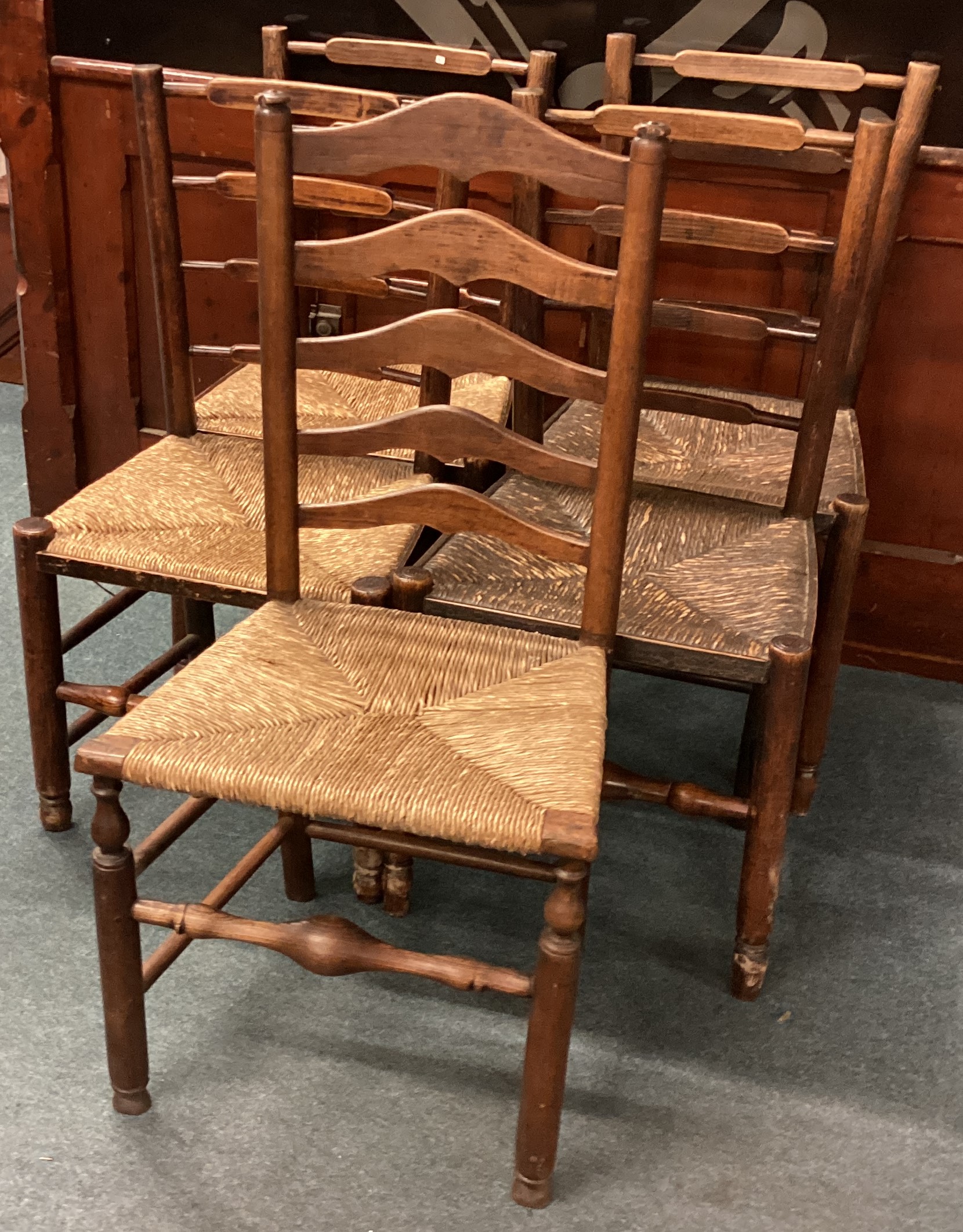 A set of oak stick back chairs.