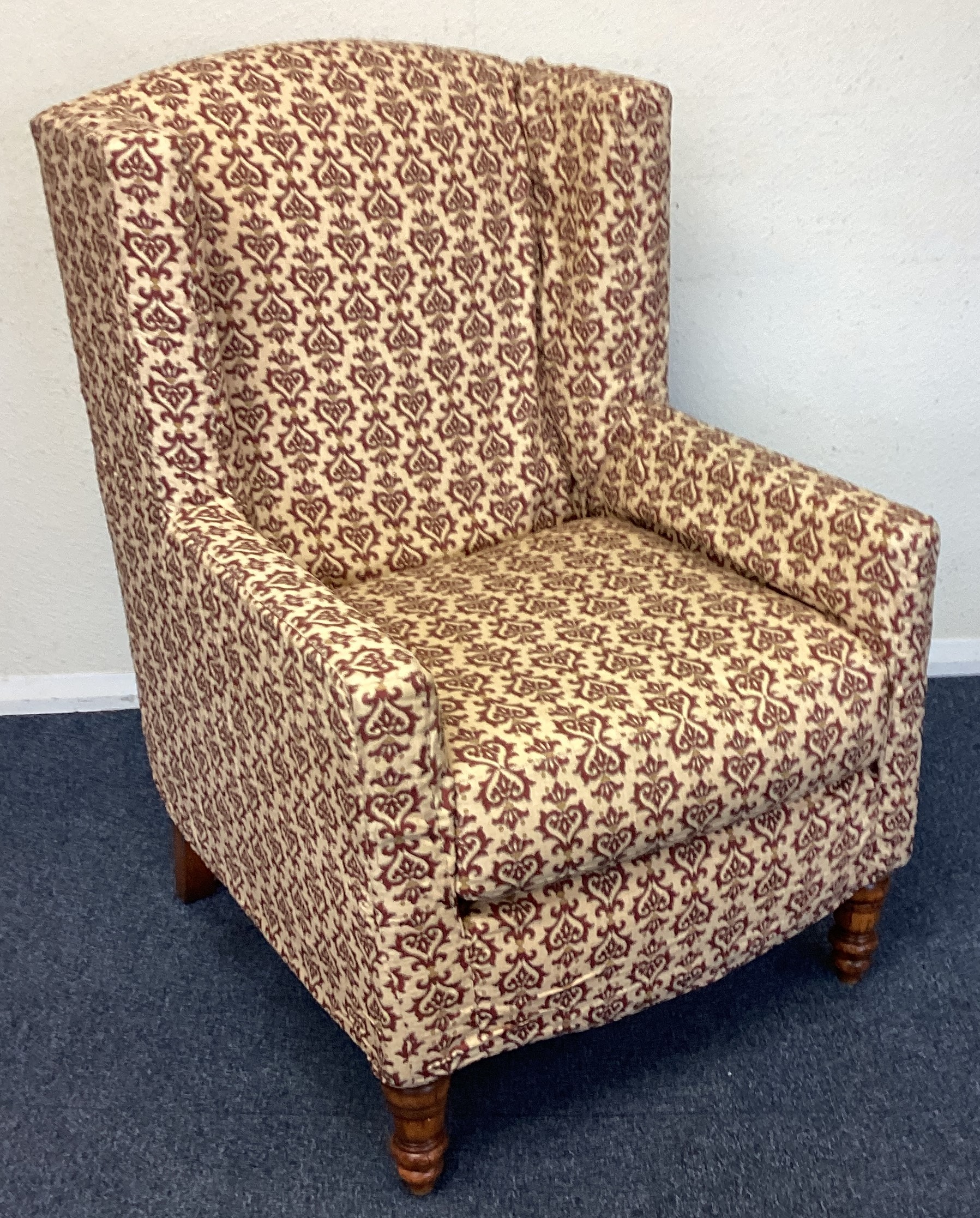 A good upholstered wingback chair.