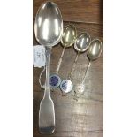 A large silver fiddle pattern tablespoon. Exeter. By WW. Together with a souvenir spoon.