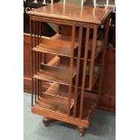 A large revolving bookcase.