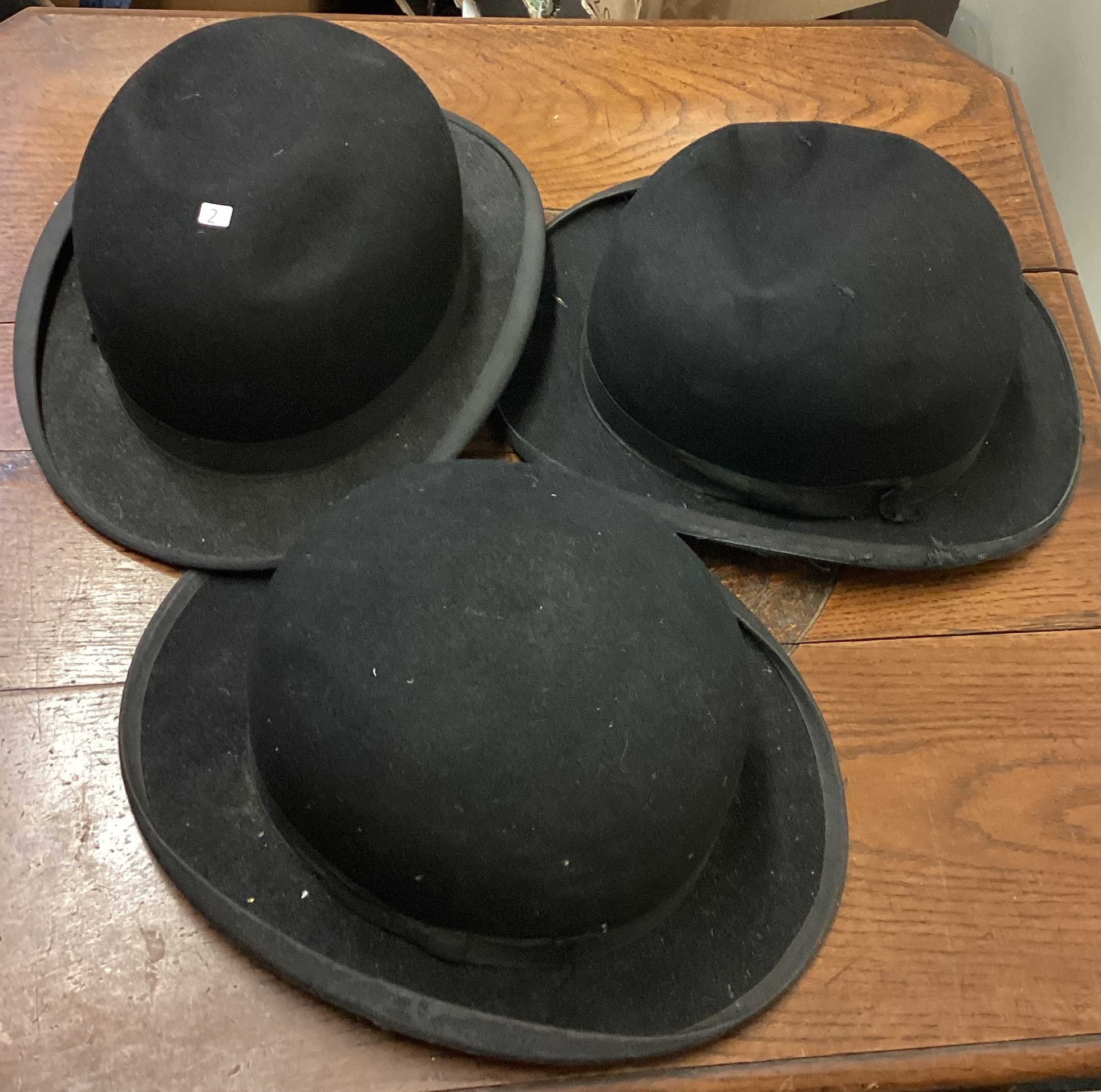 A collection of bowler hats.