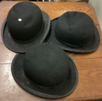 A collection of bowler hats.