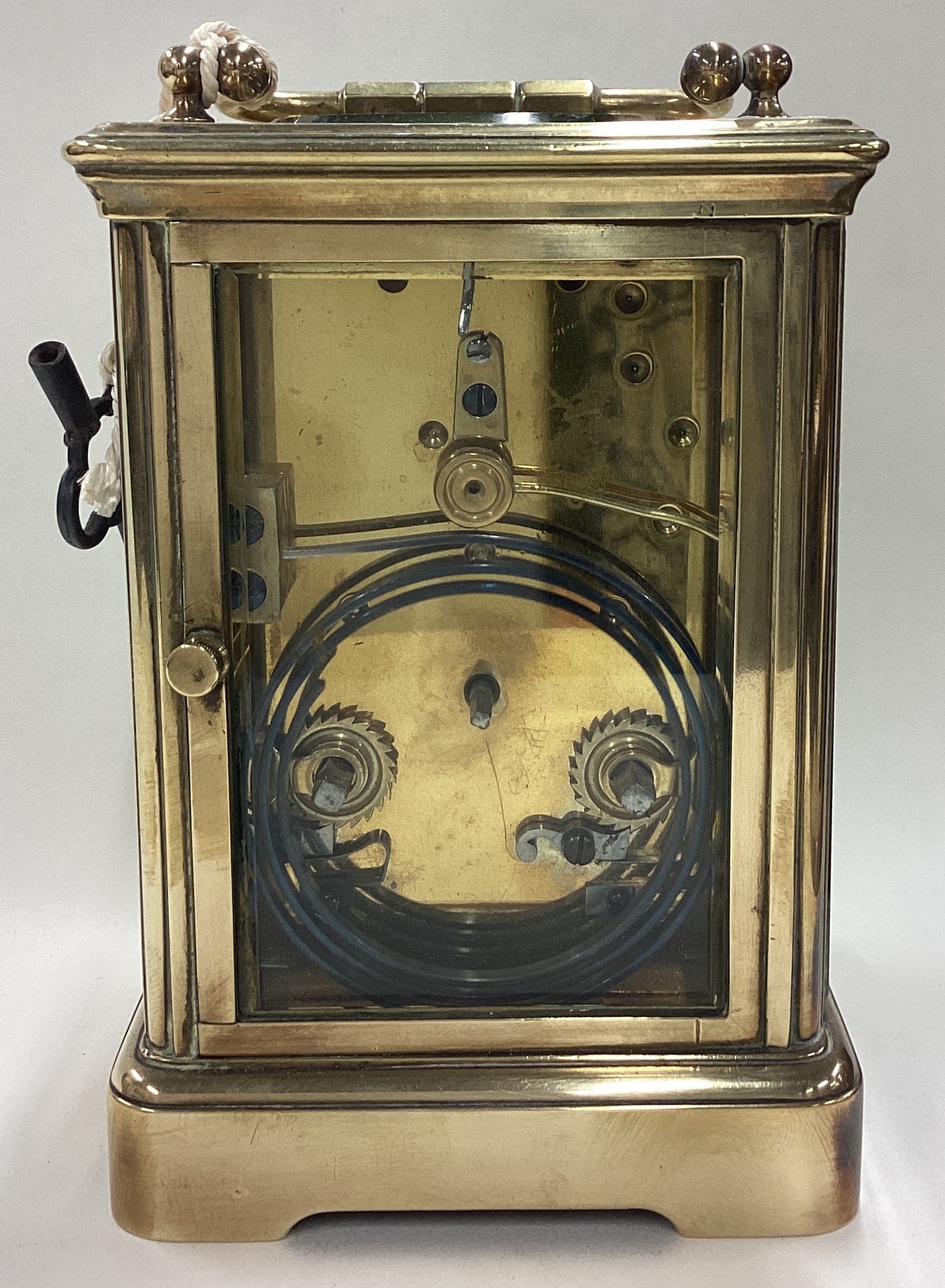 A large brass carriage clock with white enamelled dial. - Image 4 of 5