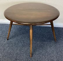 ERCOL: A small drop flap table.