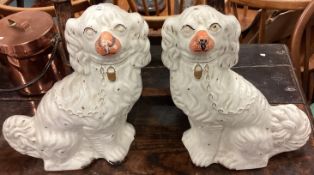 A pair of Staffordshire dogs.