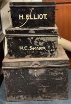 Three old metal deed boxes.
