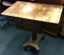 A rosewood sewing box.