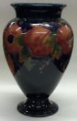 WILLIAM MOORCROFT: A large "Pomegranate" open pedestal vase. Approx. 33 cms high.