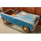 A vintage child's car.