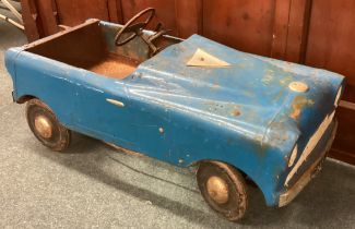 A vintage child's car.