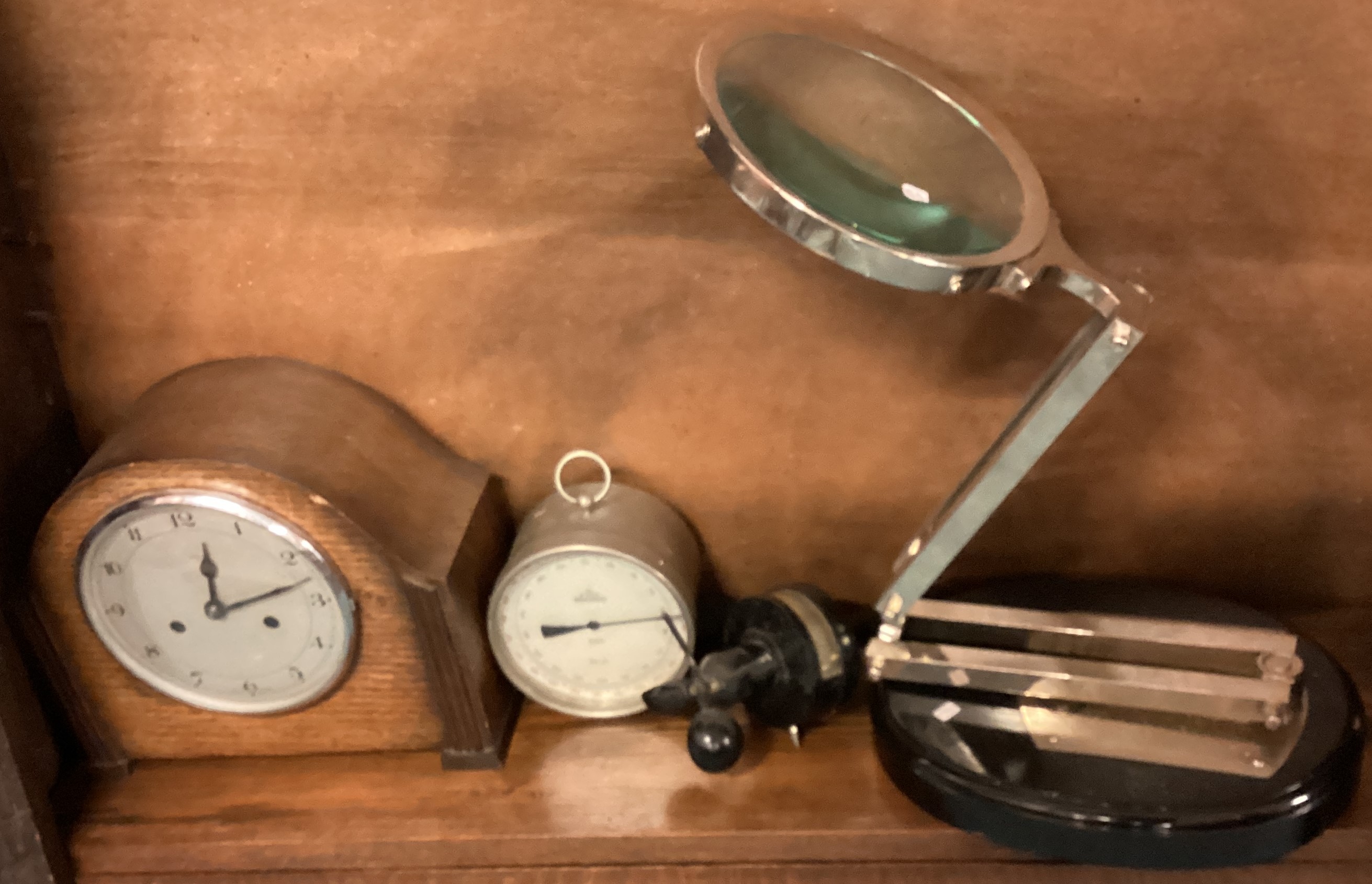 A large magnifier, clock etc.