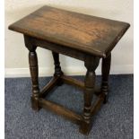 A small oak coffin stool.