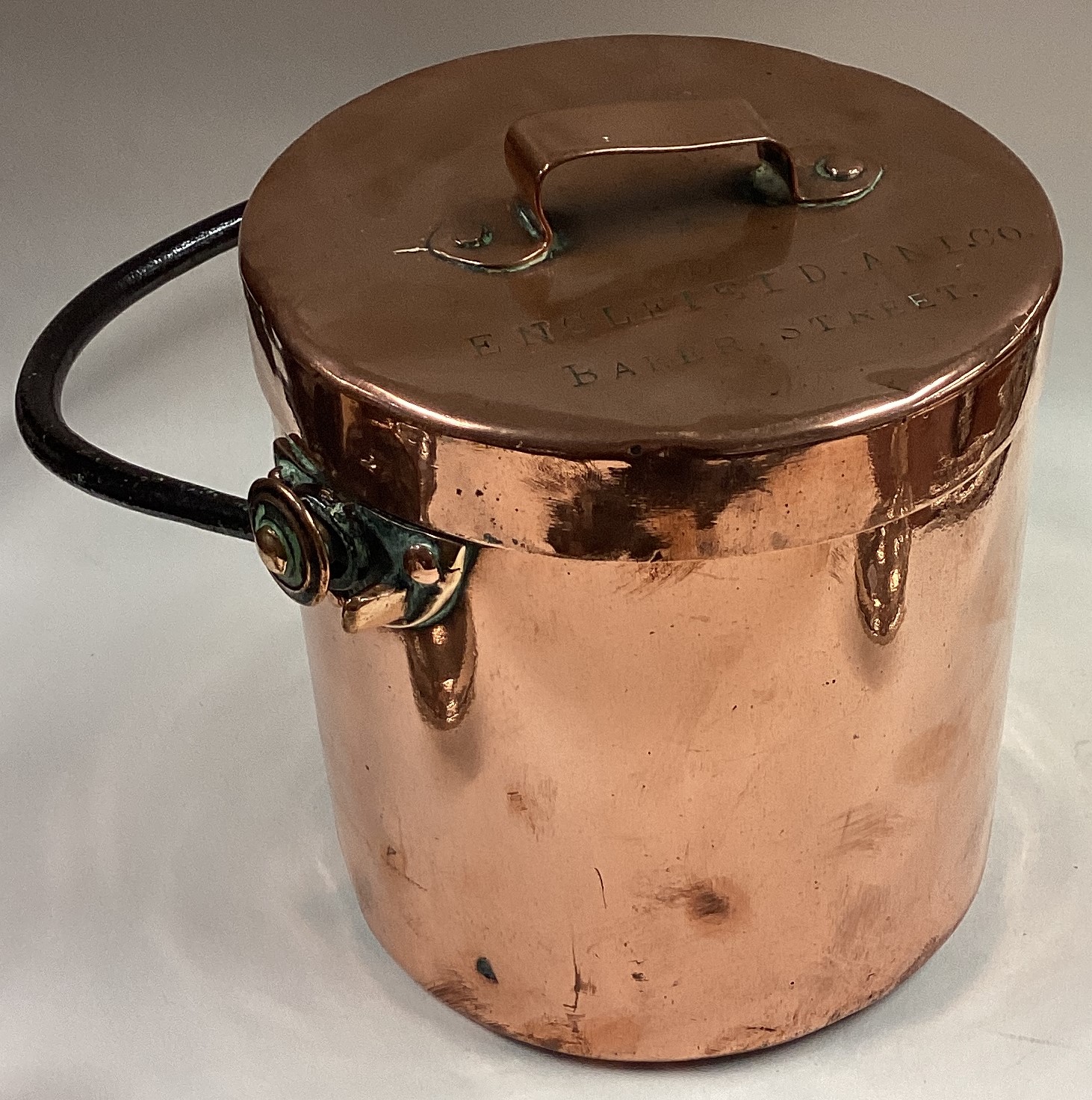 A copper and cast iron canister.