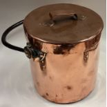 A copper and cast iron canister.