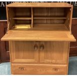 ERCOL: A good drop flap cupboard with single drawer.