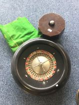 An old roulette wheel, etc.