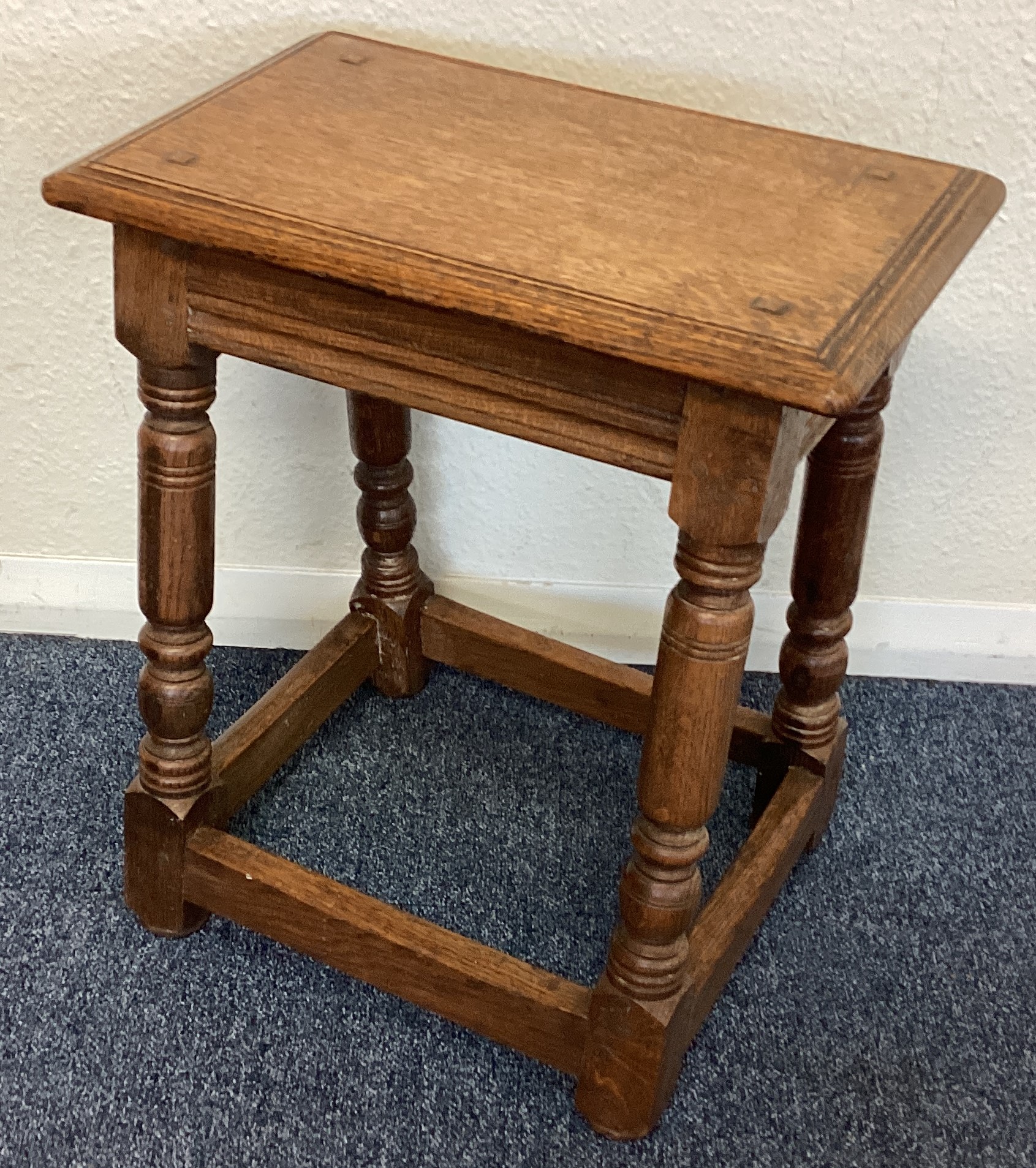 A small oak coffin stool.