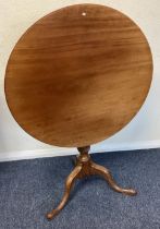 A Victorian mahogany pedestal table.