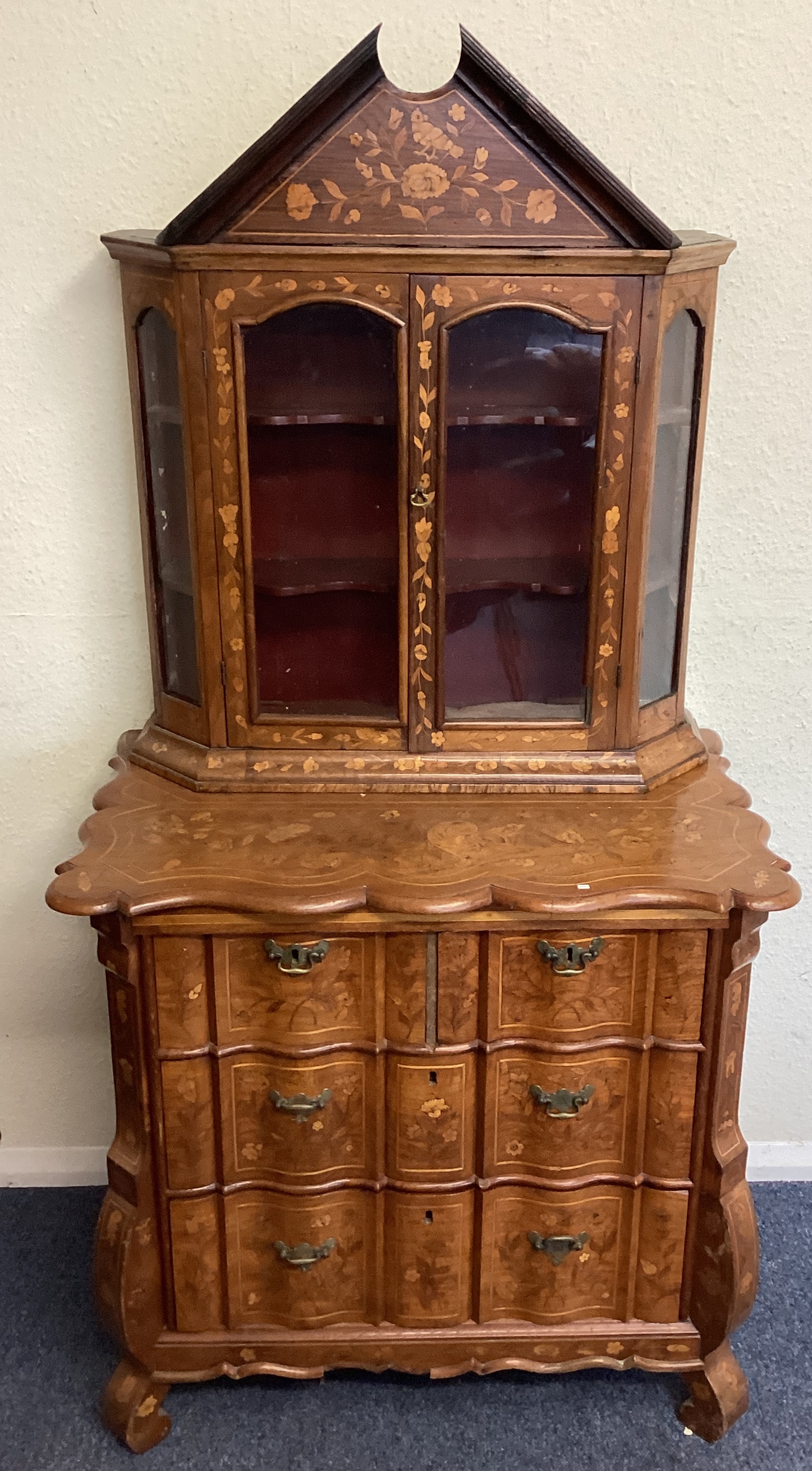 A Dutch Marquetry chest of drawers and cabinet.