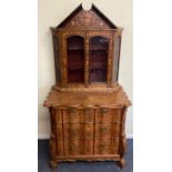 A Dutch Marquetry chest of drawers and cabinet.