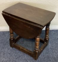 A small oak flap table.