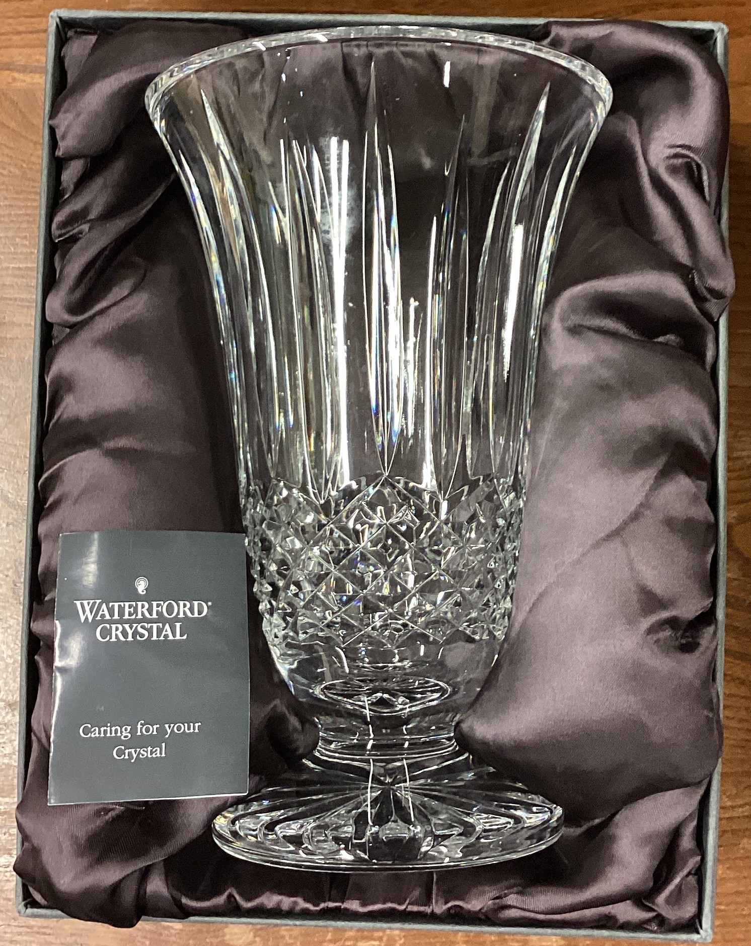 A large Waterford crystal vase with original box.