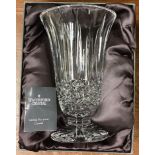 A large Waterford crystal vase with original box.