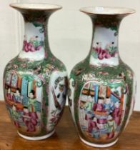 A pair of Canton vases with figural decoration.