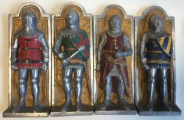 A set of four aluminium wall plaques depicting knights.