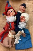 A set of Punch and Judy puppets.