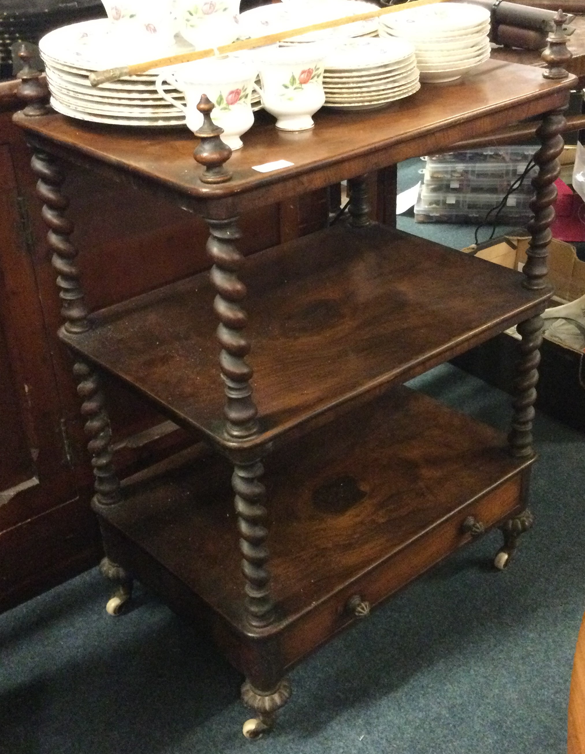 A Victorian walnut music cabinet.