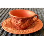 FERDINAND GERBING WITWE: A small terracotta teacup and saucer.