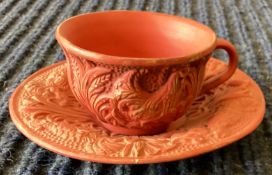 FERDINAND GERBING WITWE: A small terracotta teacup and saucer.