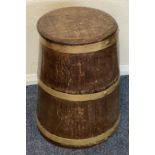 An oak barrel shaped box.