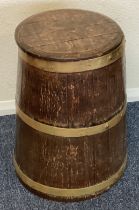 An oak barrel shaped box.