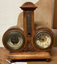 An old oak barometer / clock.