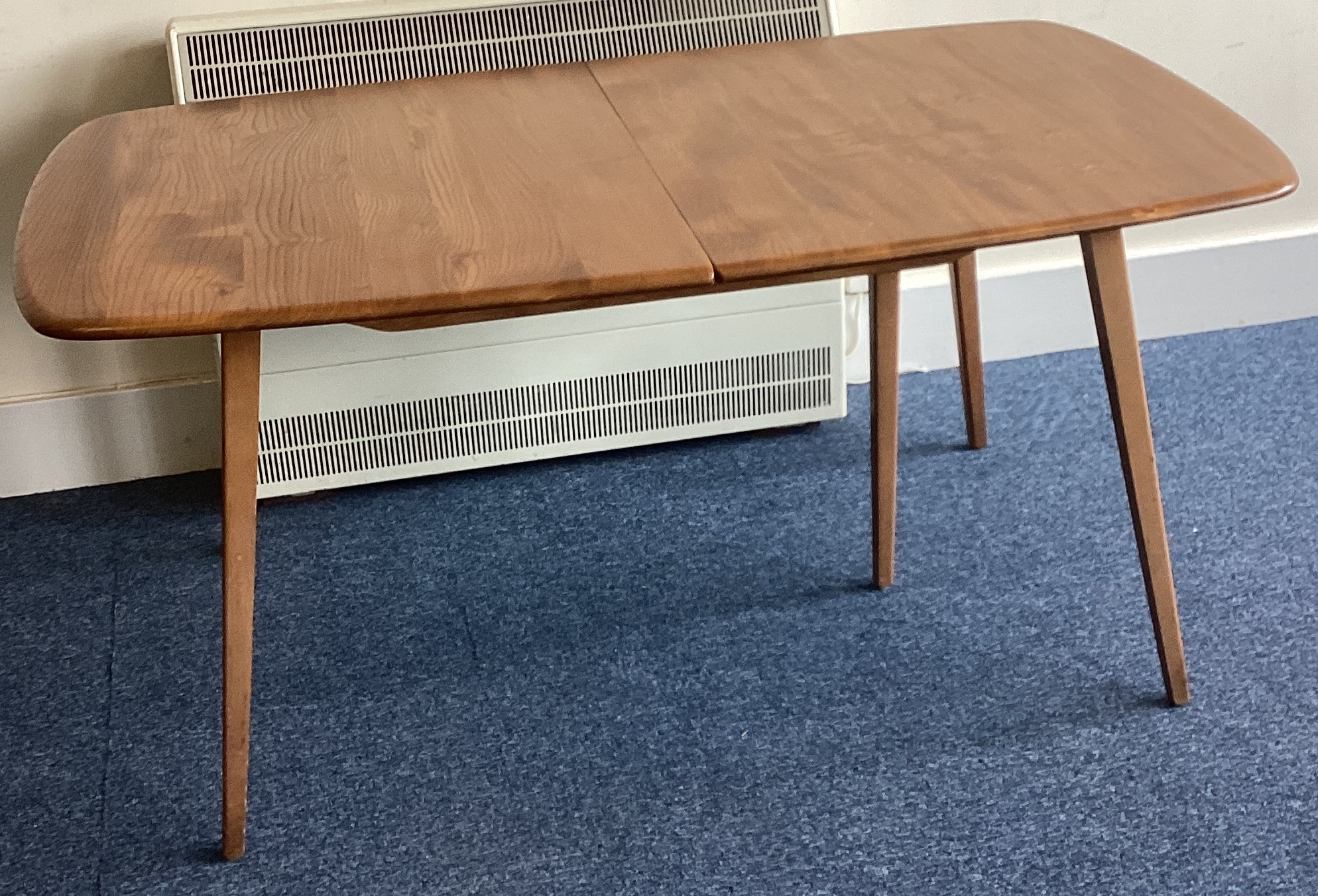 ERCOL: A draw leaf table on four spreading supports. - Image 2 of 2