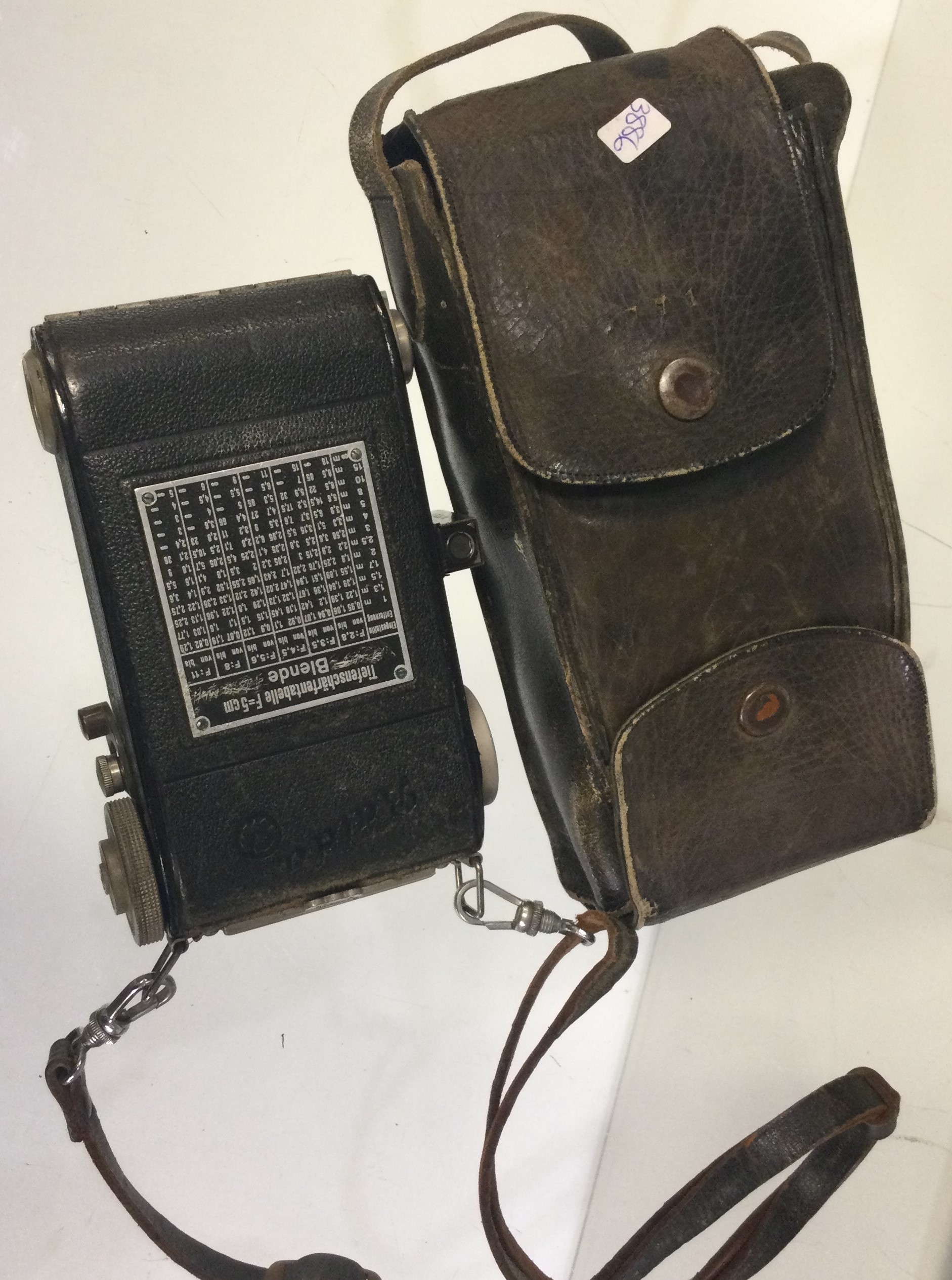 A Balda Jubilette camera with original leather car