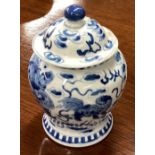 A good Chinese blue and white vase and cover of circular form. Signed to base.