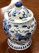 A good Chinese blue and white vase and cover of circular form. Signed to base.